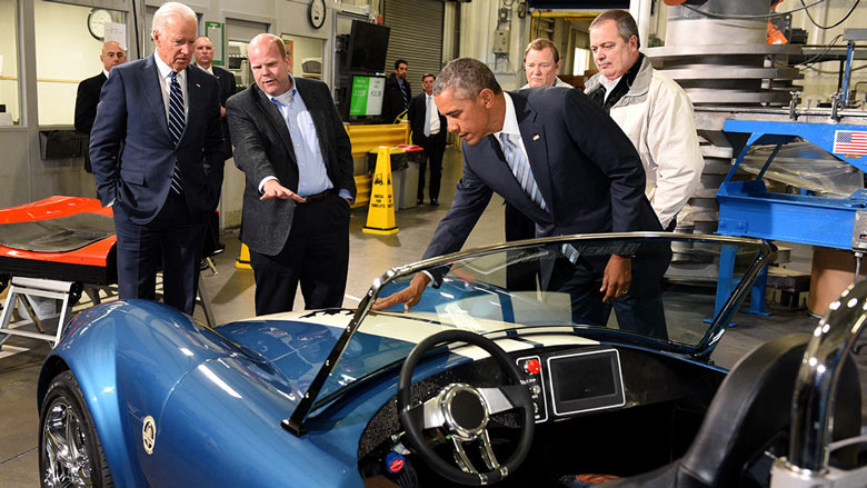 Barack Obama and Joe Biden inspecting 3-D printed car