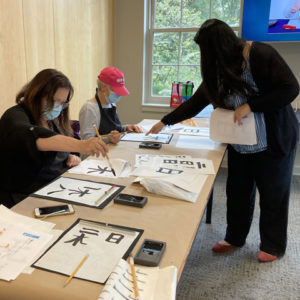 Tennessee Language Center students learning calligraphy
